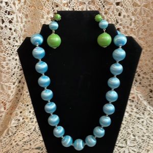 Vintage chunky blue beaded statement necklace with matching earrings.